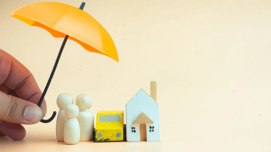 Business interruption insurance for landlords - A small umbrella covering a landlord’s home and their tenants.